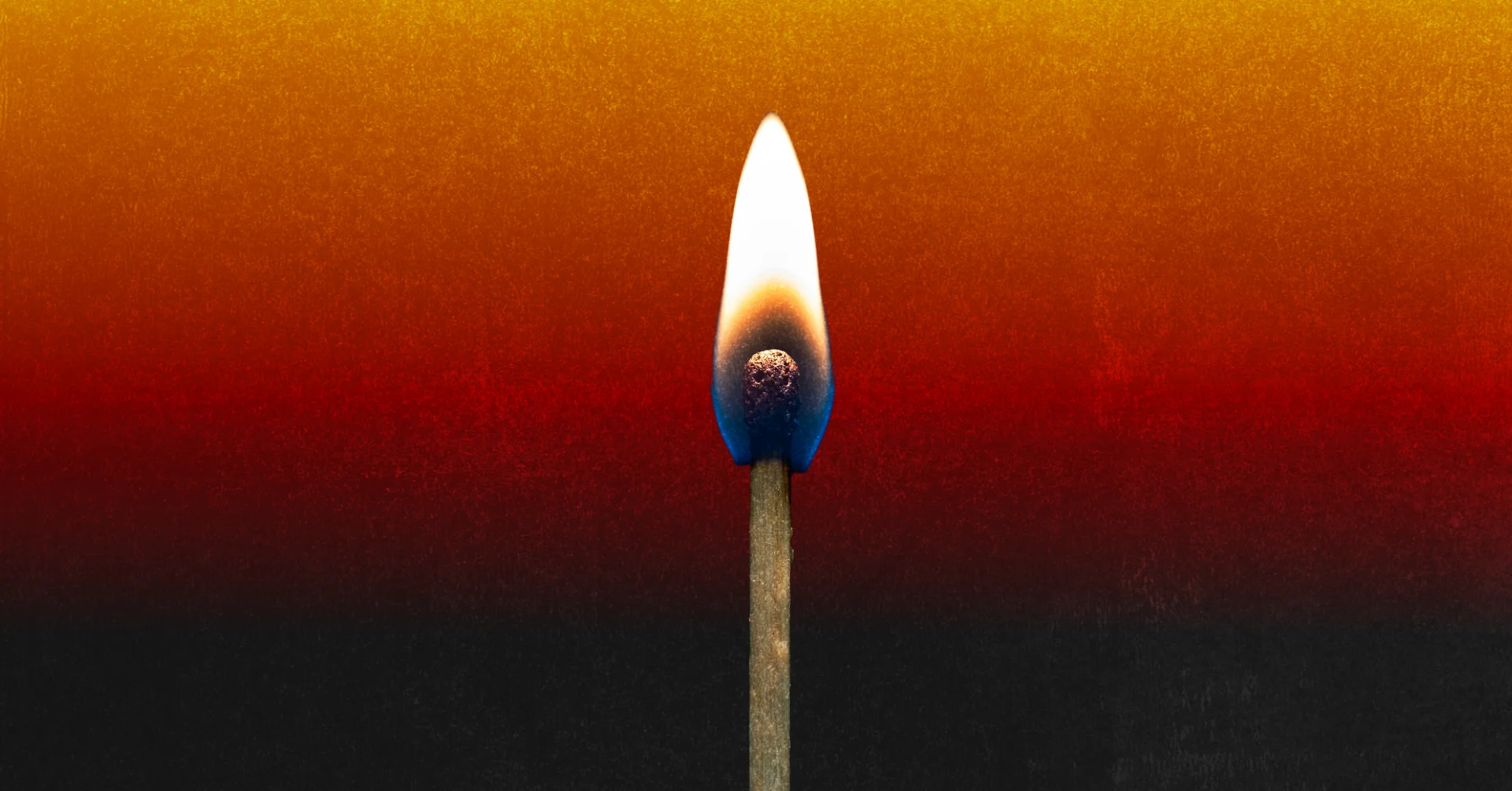 A burning match