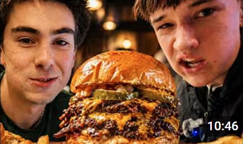 Two Greenwich Central School interns presenting their burger video project